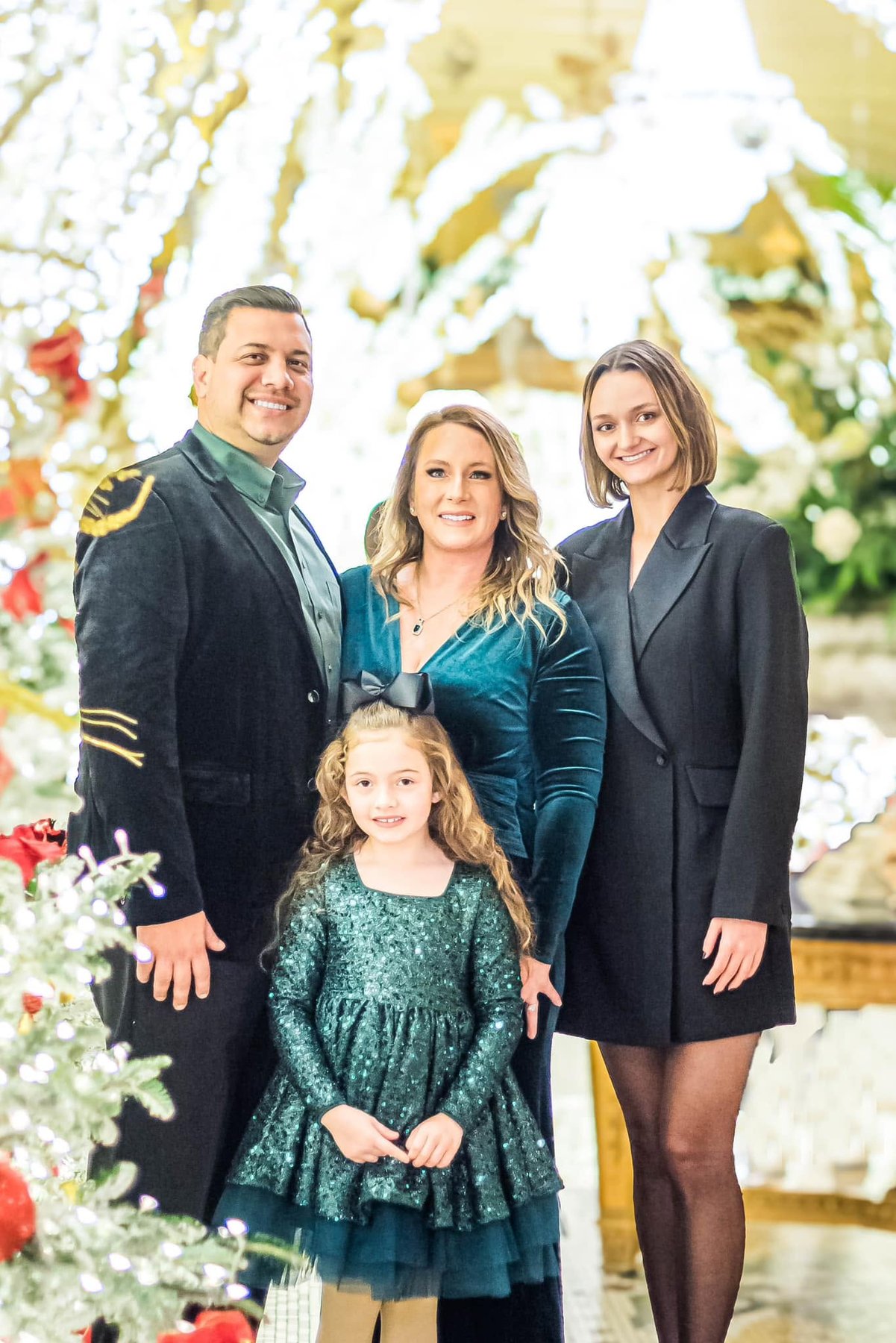 Daniel Seuzeneau with his wife and two daughters at Christmas